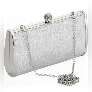 Juanaline Silver Clutch Bag
